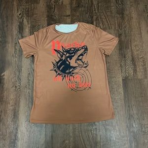 T shirt, lion on front.